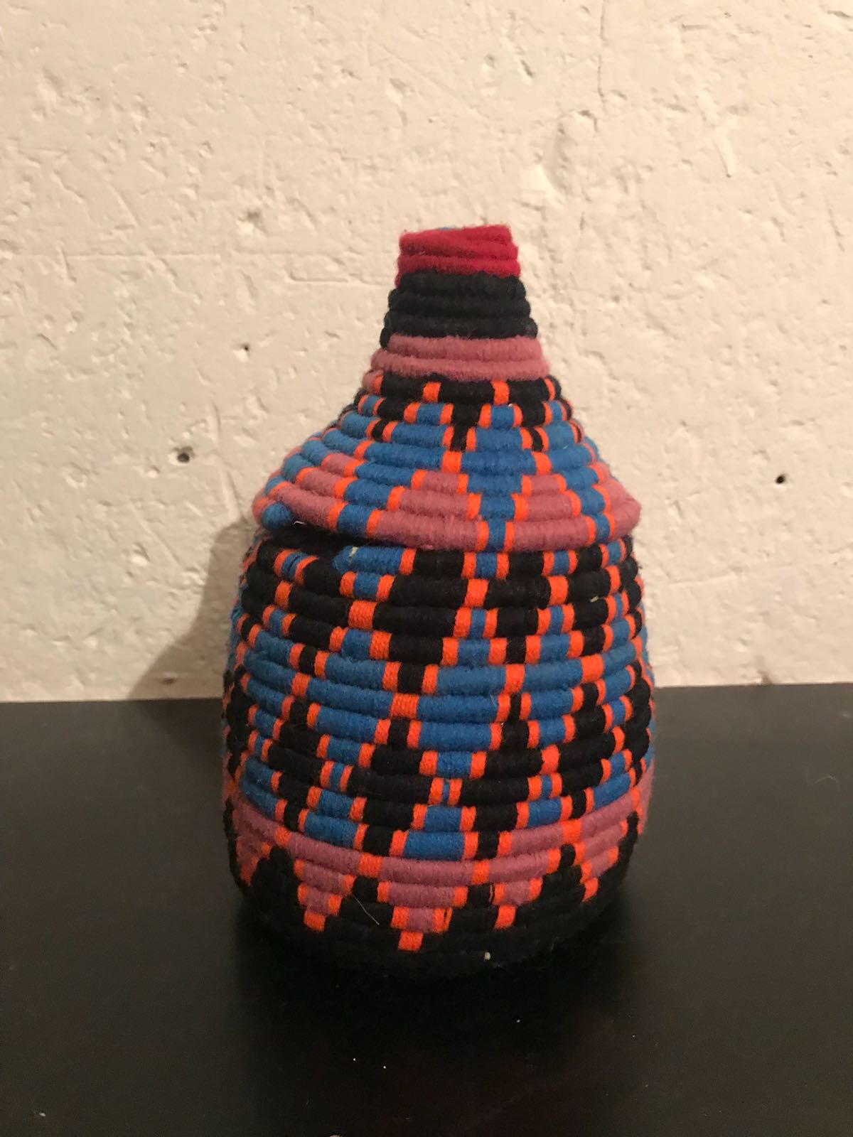 Berber wool and black and Red raffia basket