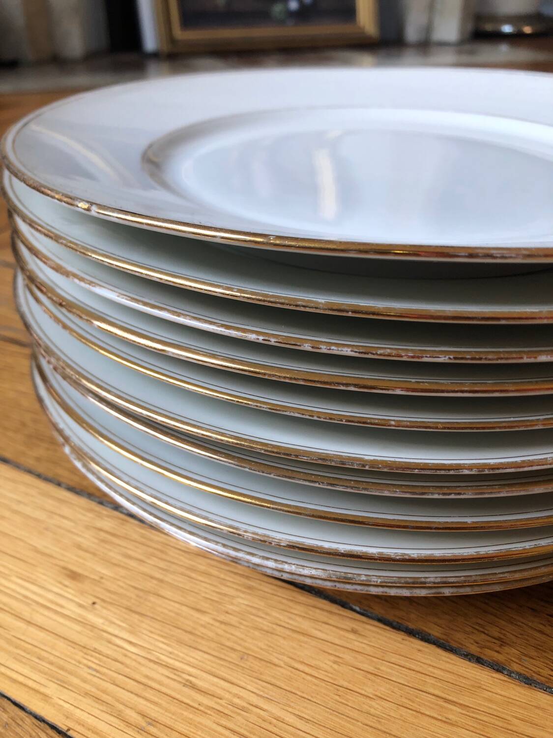 Lot of 28 porcelain plates with golden edging