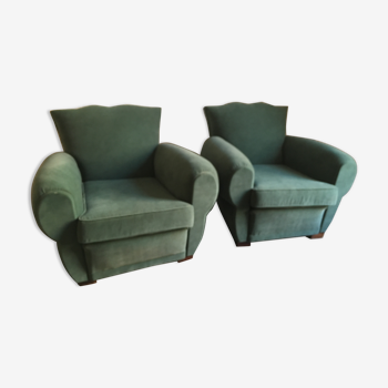 Pair of club armchairs with mustache