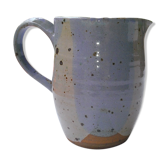 Artisanal speckled stoneware pitcher