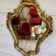 Vintage wall mirror in Louis XV / Baroque style – Carved wooden frame in gold.