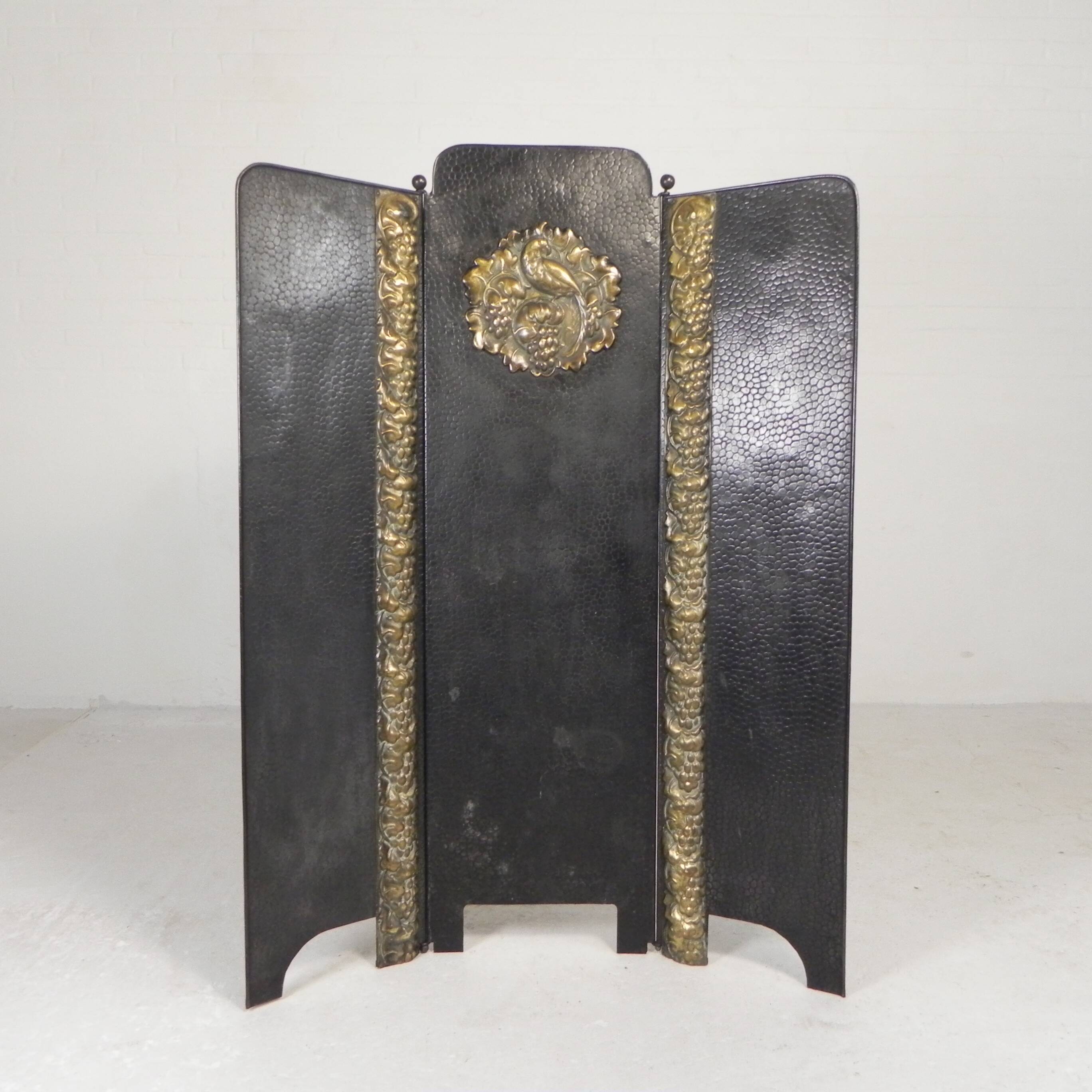 Art Deco screen in steel with brass details, 1930s.