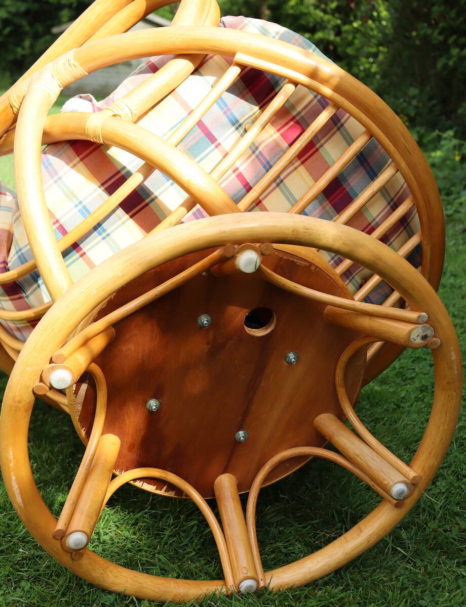 Swivel rattan armchair with matching ottoman