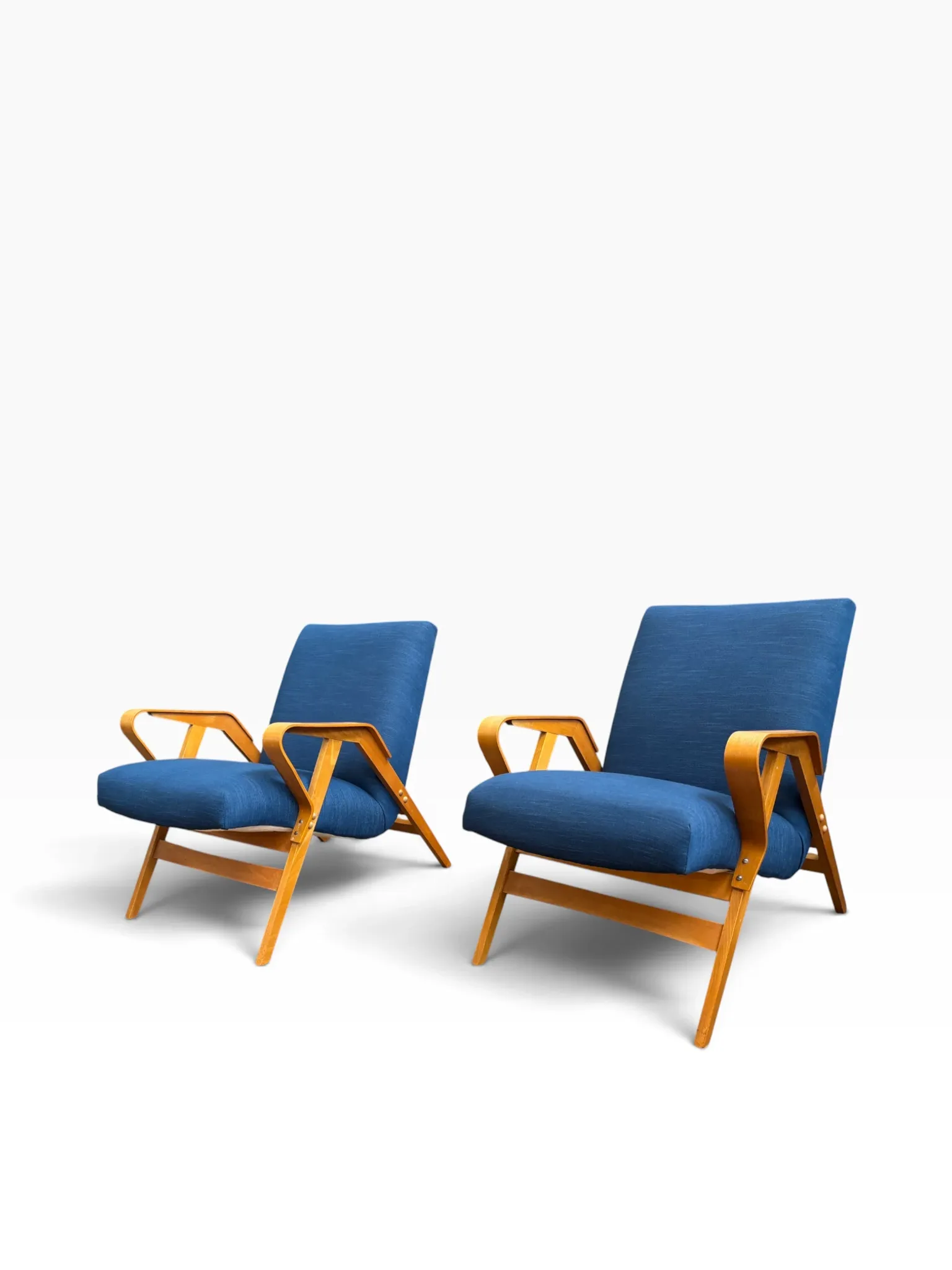 Set of 2 blue lounge chairs restored by František Jirák for Tatra Nabytok.