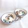 Pair of handmade cracked earthenware hand candlesticks signed Bassano Italy