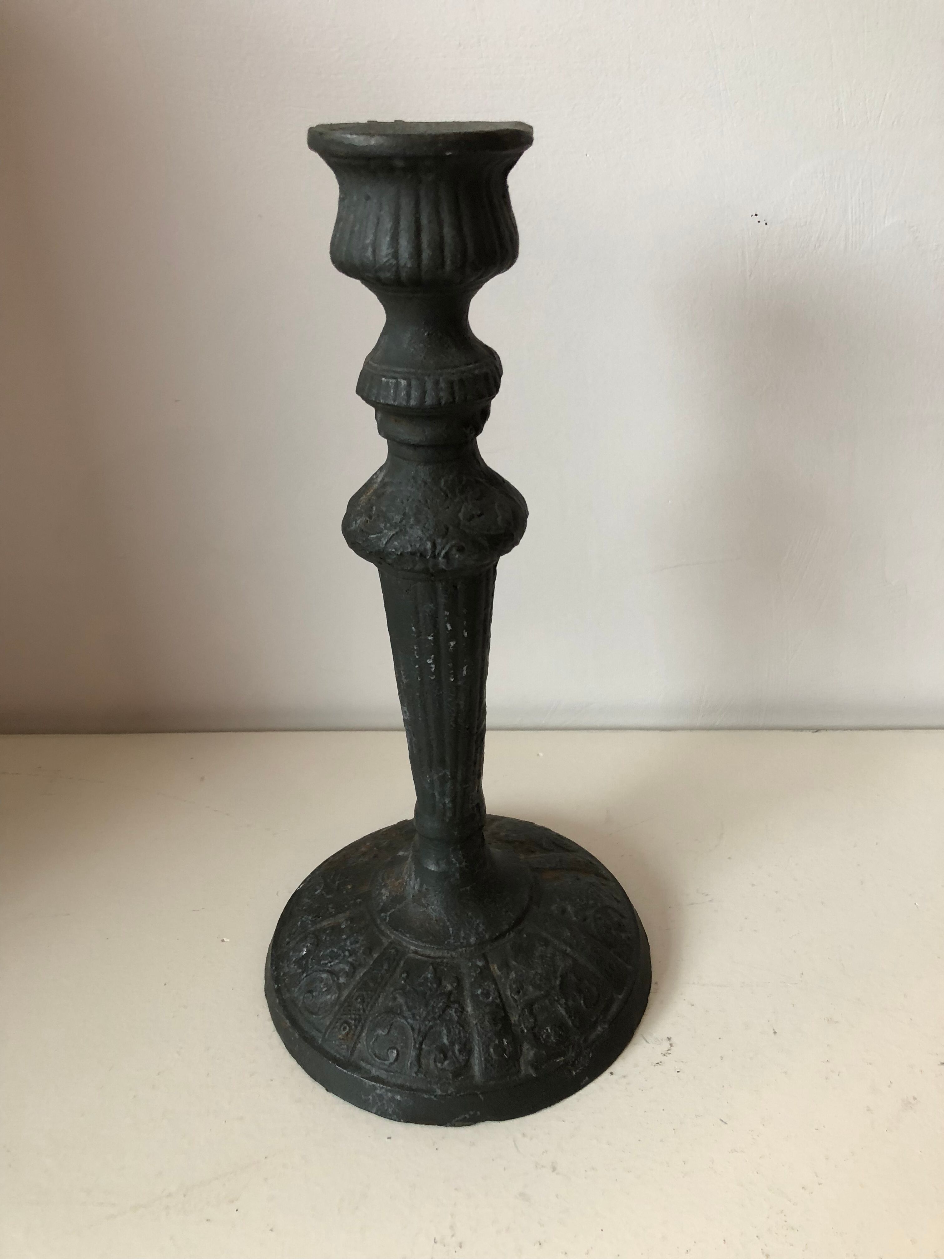 Old cast iron candlestick