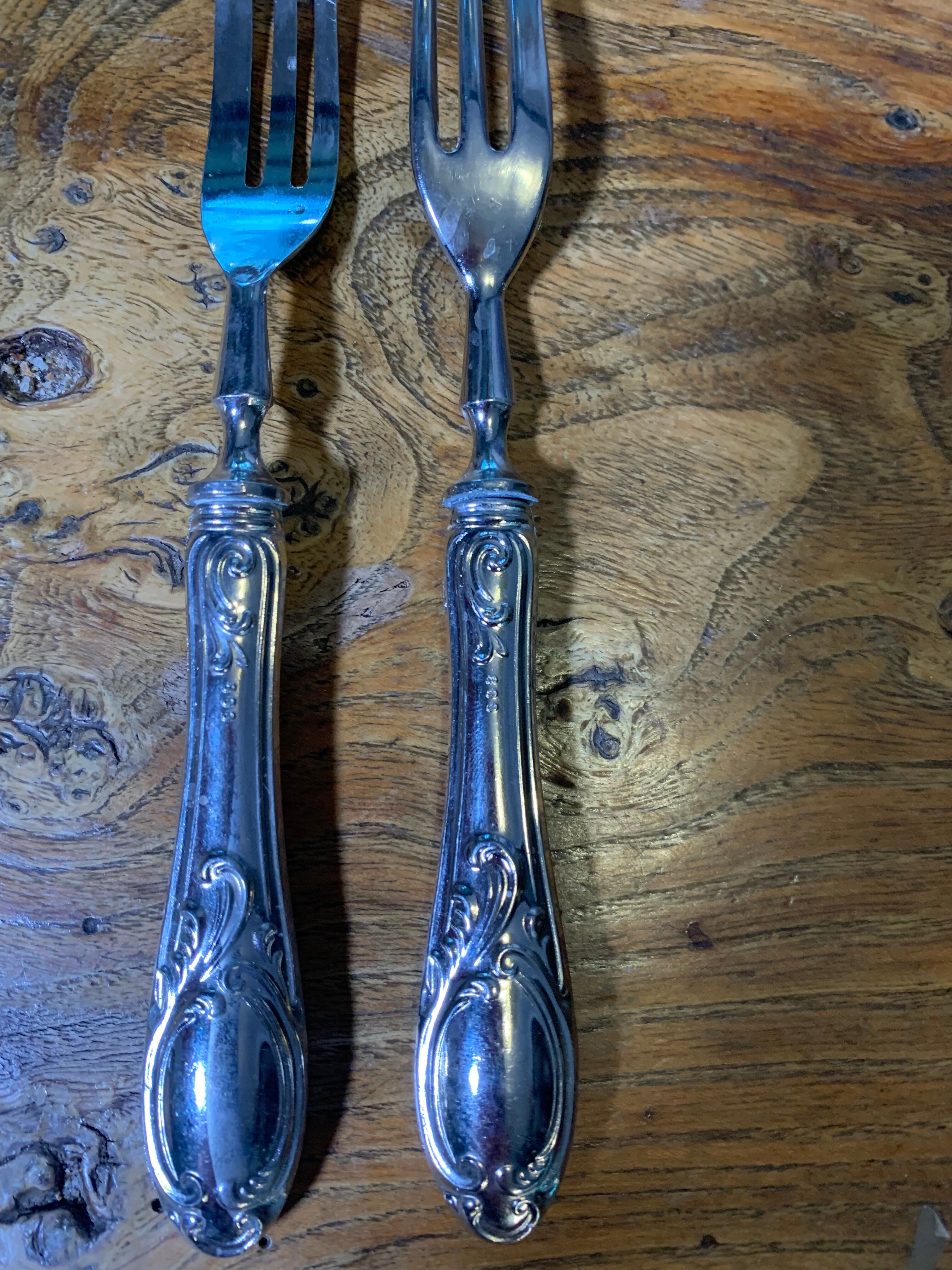 Service de couverts à dessert composé de 11 pièces poinçon 800 ouvragées anciens et collector