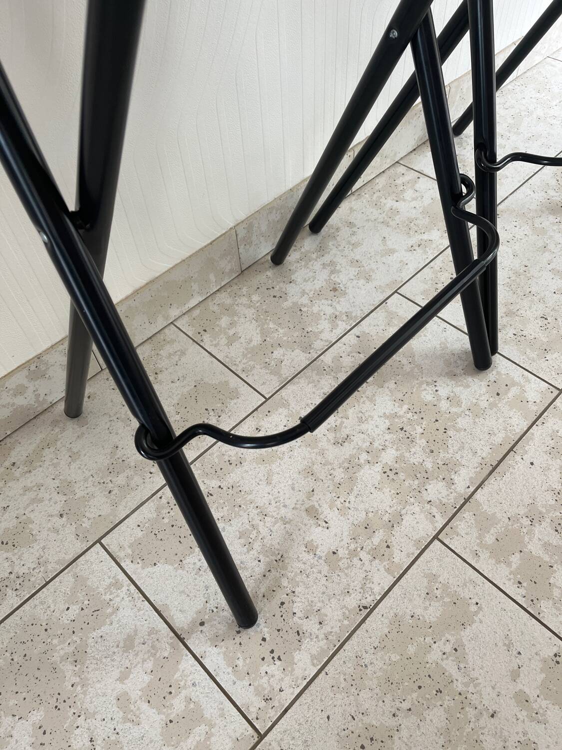 2 foldable bar stools from the 90s in wood and black metal