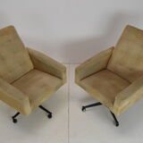 Pair of mid-century swivel armchairs with wheels 1970's