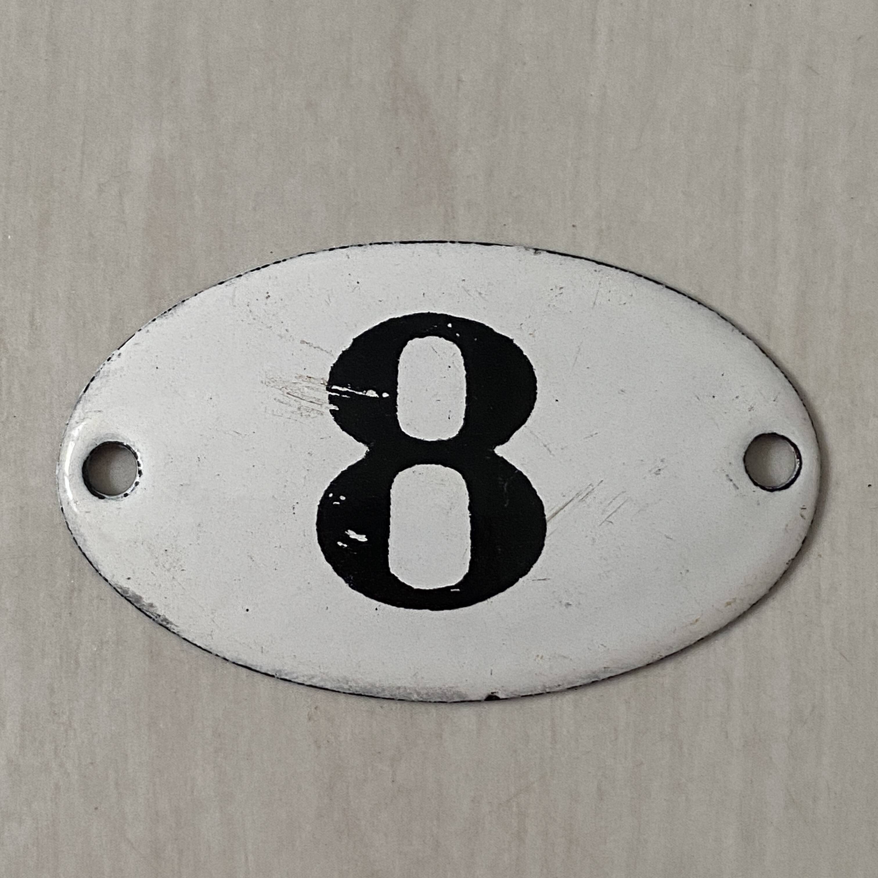 Small old enameled plaque number 8