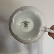 Set of 4 Hutschenreuther fine porcelain cups and saucers.