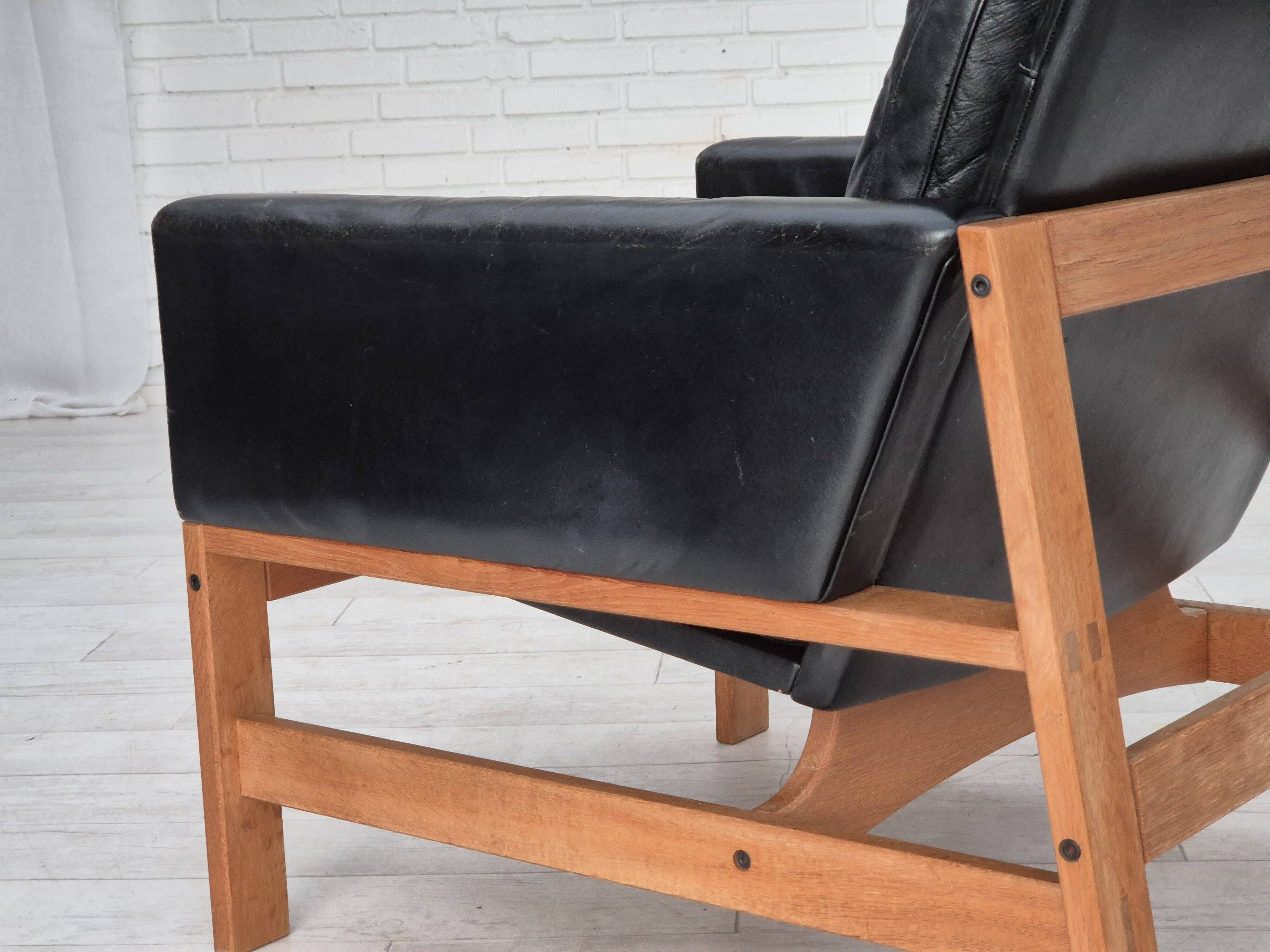1960s, Danish lounge chair, original condition, furniture leather, solid oak wood.