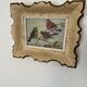 Vintage painting on panel of 3 tits on a branch.