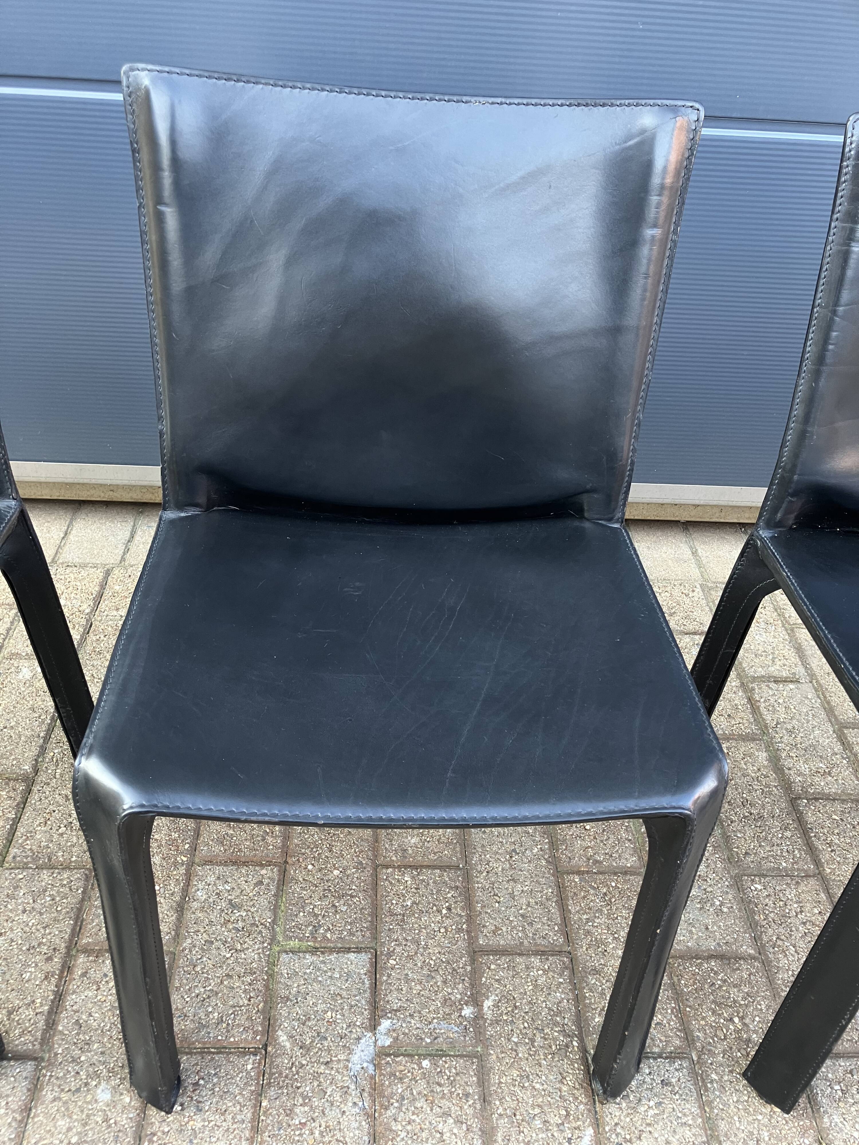 4 black Cassina Cab chairs by Mario Bellini