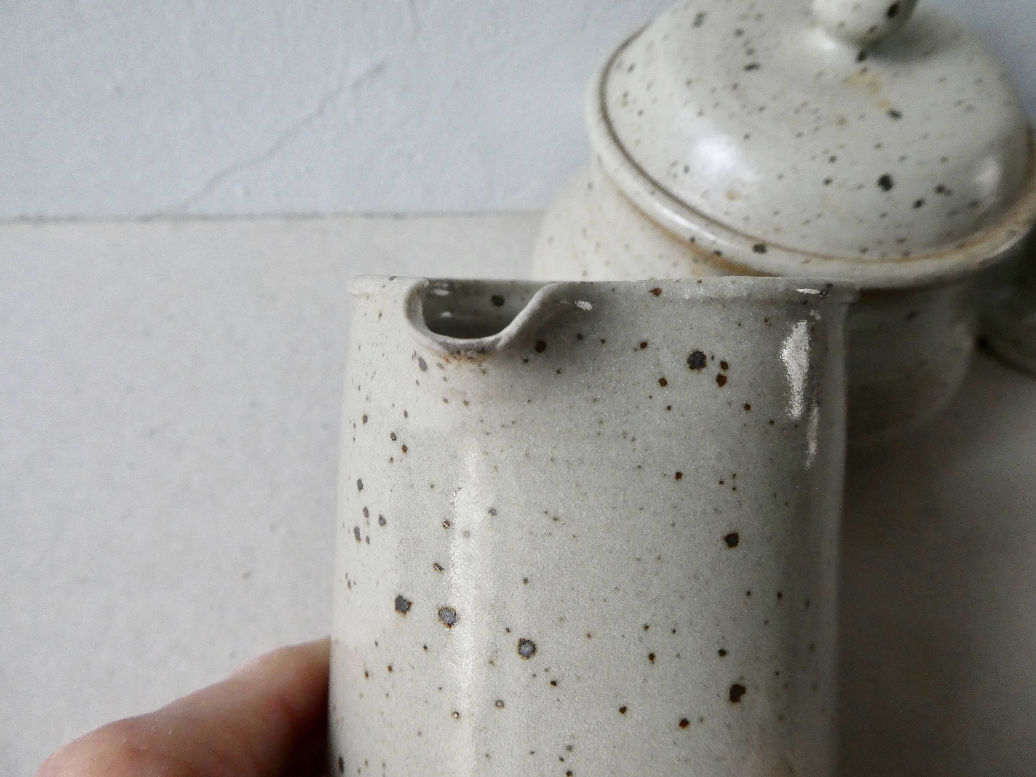 Set of 4 cups, 1 mazagran, 1 milk pot and 1 sugar bowl in pyrity sandstone, signed