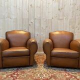 Pair of art deco leather club armchairs
