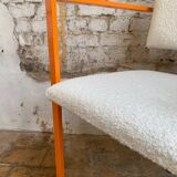 Pair of postmodern orange armchairs and bouclé wool fabric