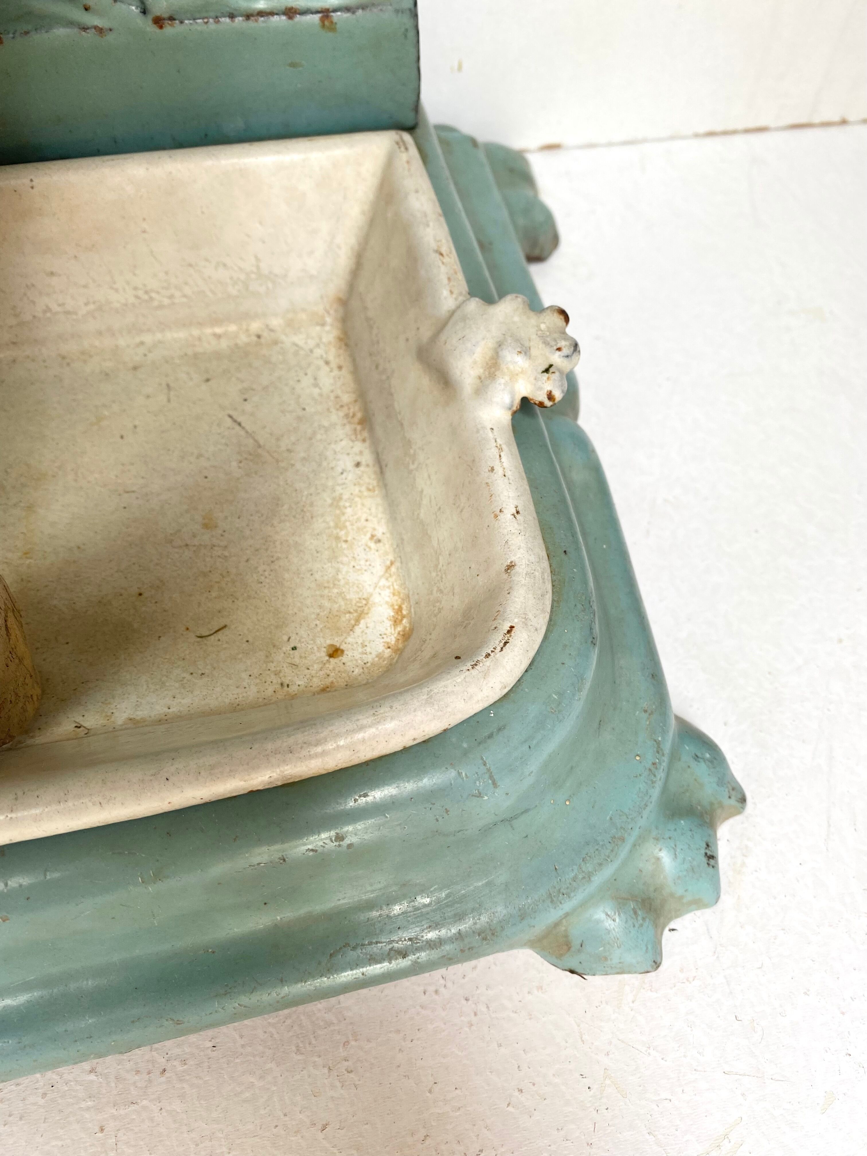Enameled cast iron umbrella stand from the early 20th century