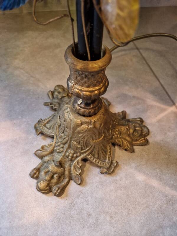 Bronze table lamp and Murano glass grape clusters.