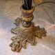 Bronze table lamp and Murano glass grape clusters.
