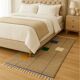 Beige Berber rug, wool, modern square patterns.