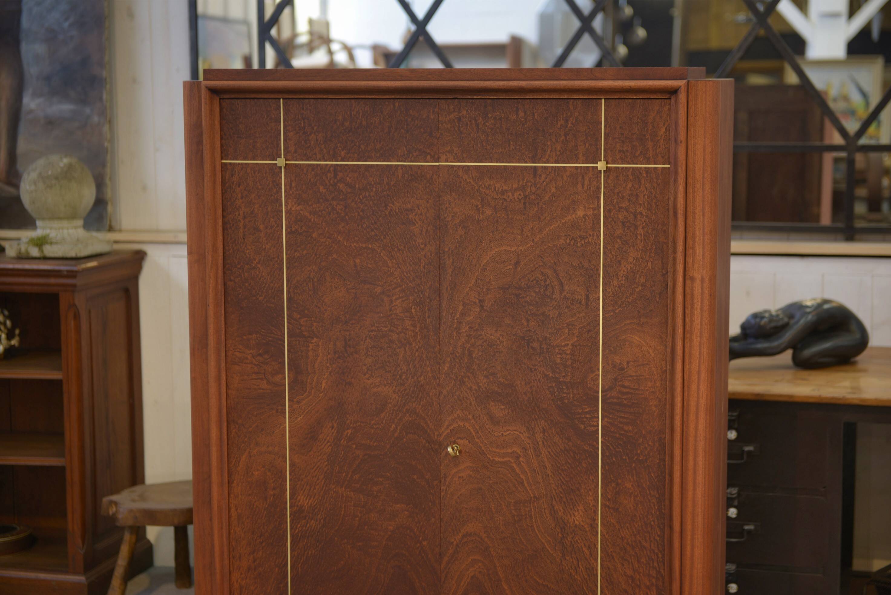 Art Deco mahogany wardrobe, signed A. Bicchierini, 1940s.