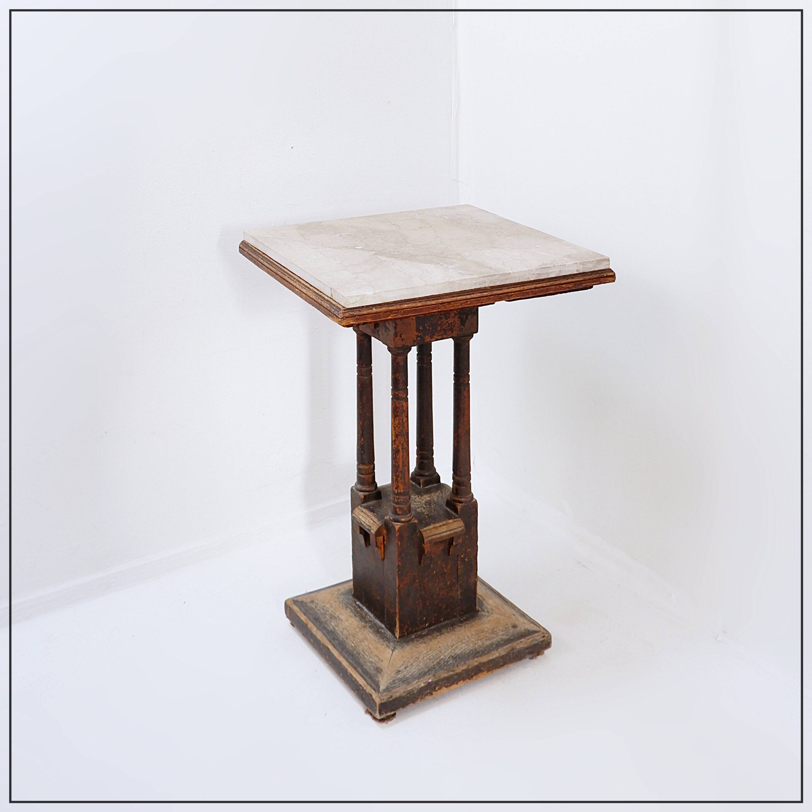 Pedestal table in wood and marble