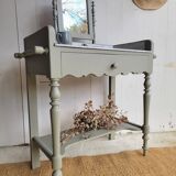Antique wooden dressing table with marble top and mirror.