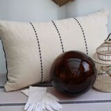 Embroidered linen cushion