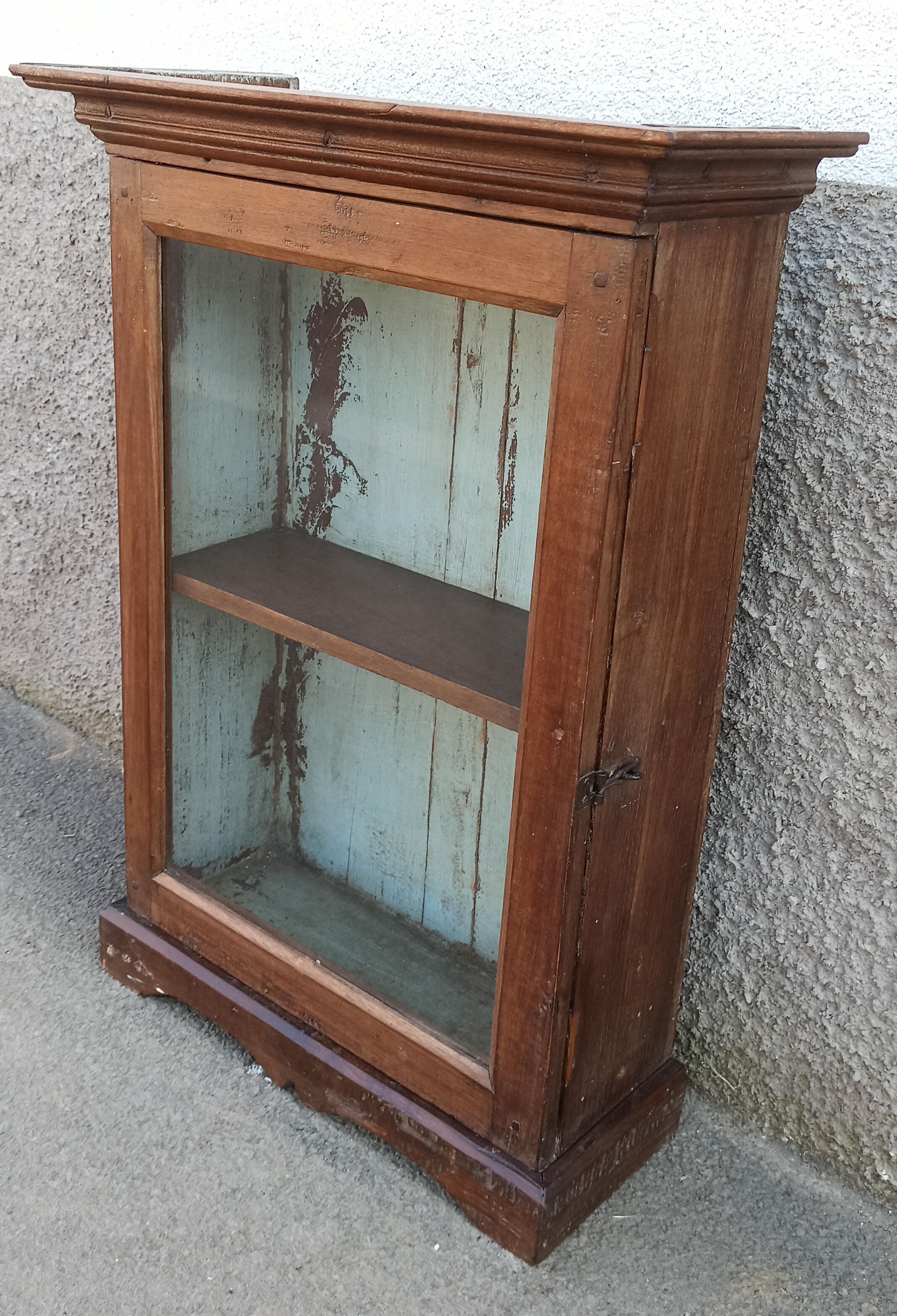 Old wardrobe with glass door