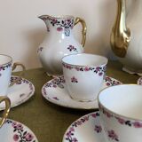 18-piece porcelain coffee set signed "Aux Lions de Faïence Paris"