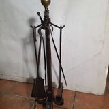 Antique fireplace set in solid wrought iron and brass.