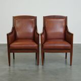 Majestic, luxurious set of 4 cognac-colored cowhide leather Art Deco design armchairs