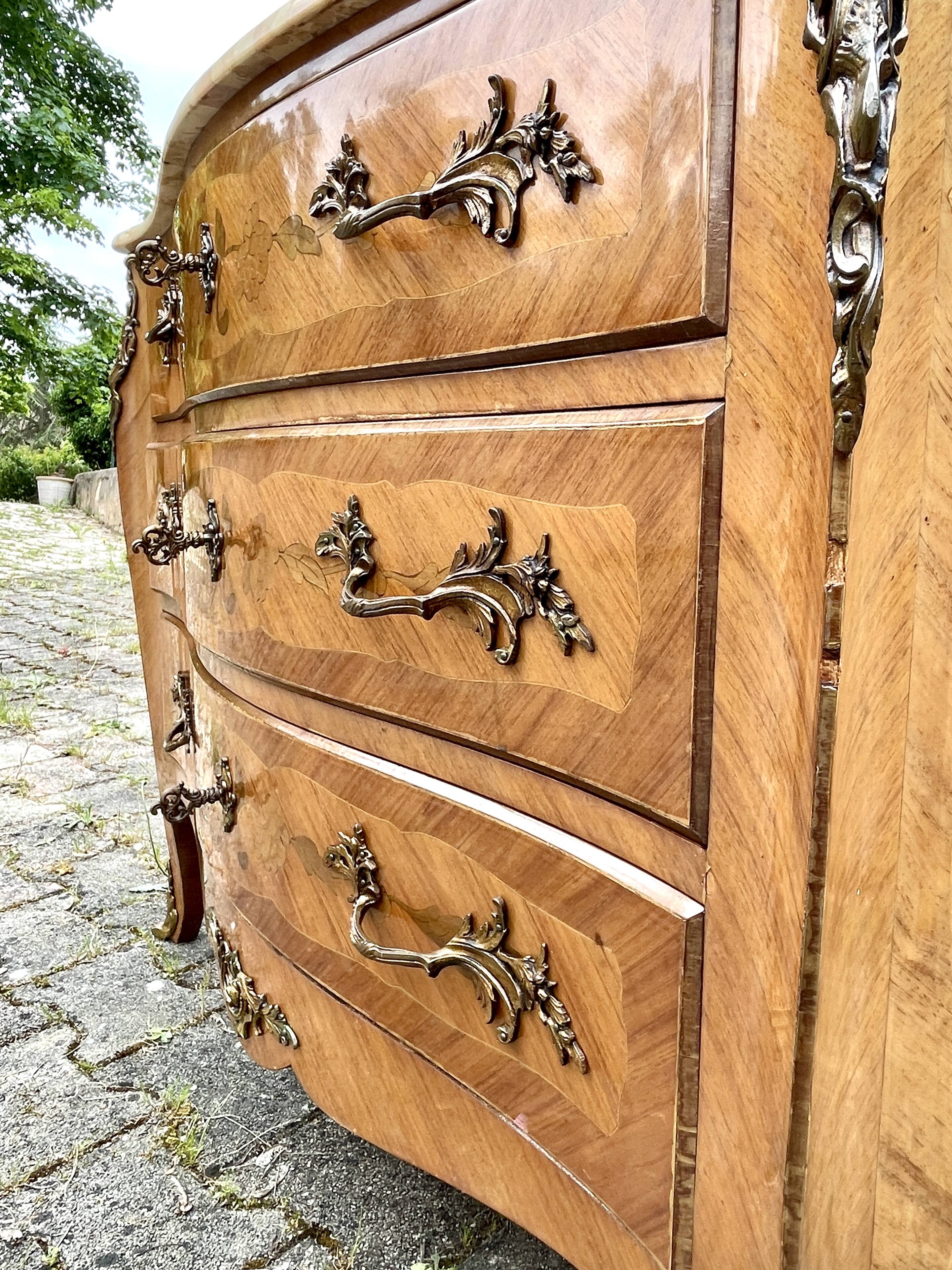 Louis XV style commode in marquetry, 20th century.