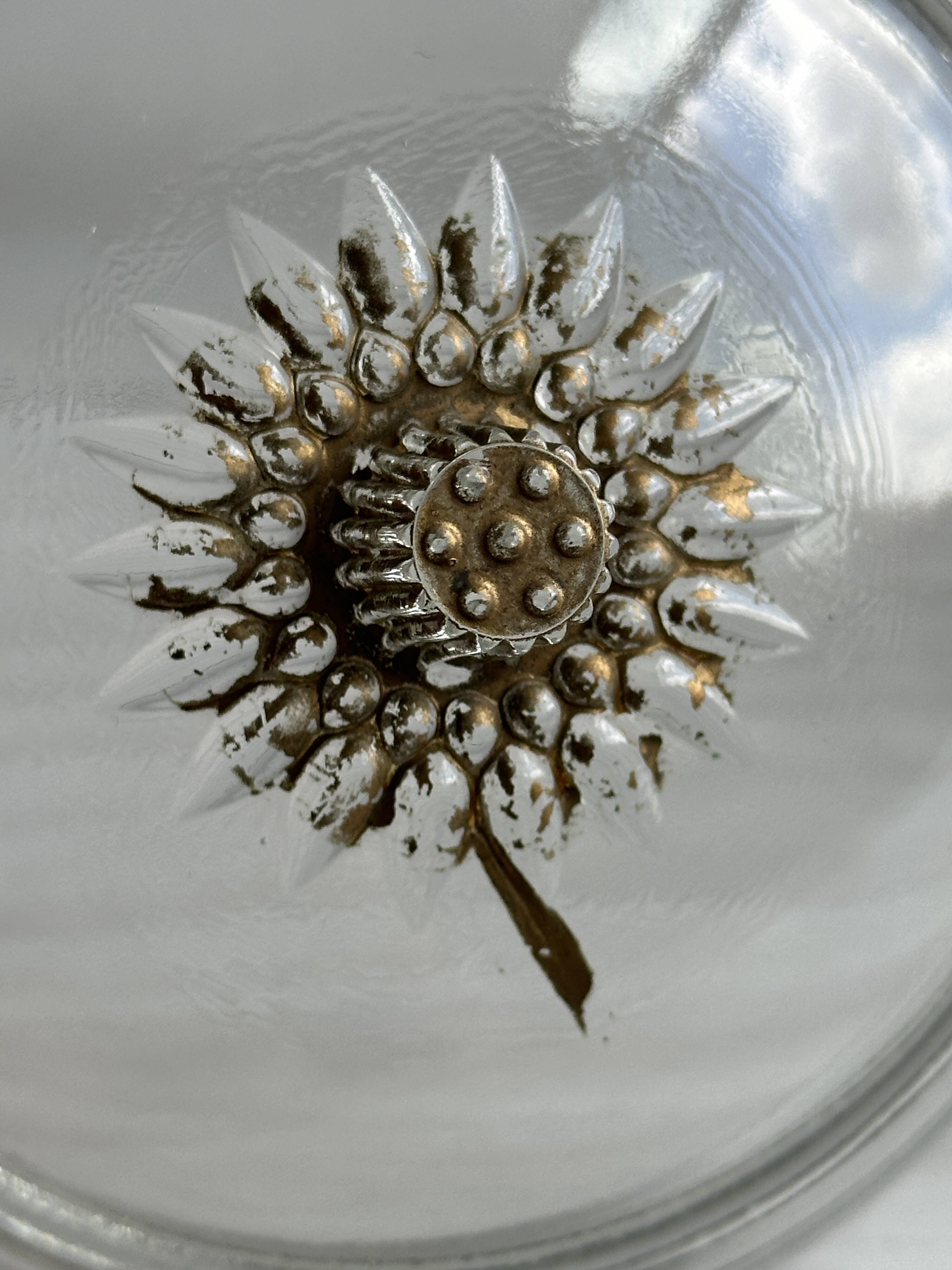 Glass sugar bowl with floral decoration lid