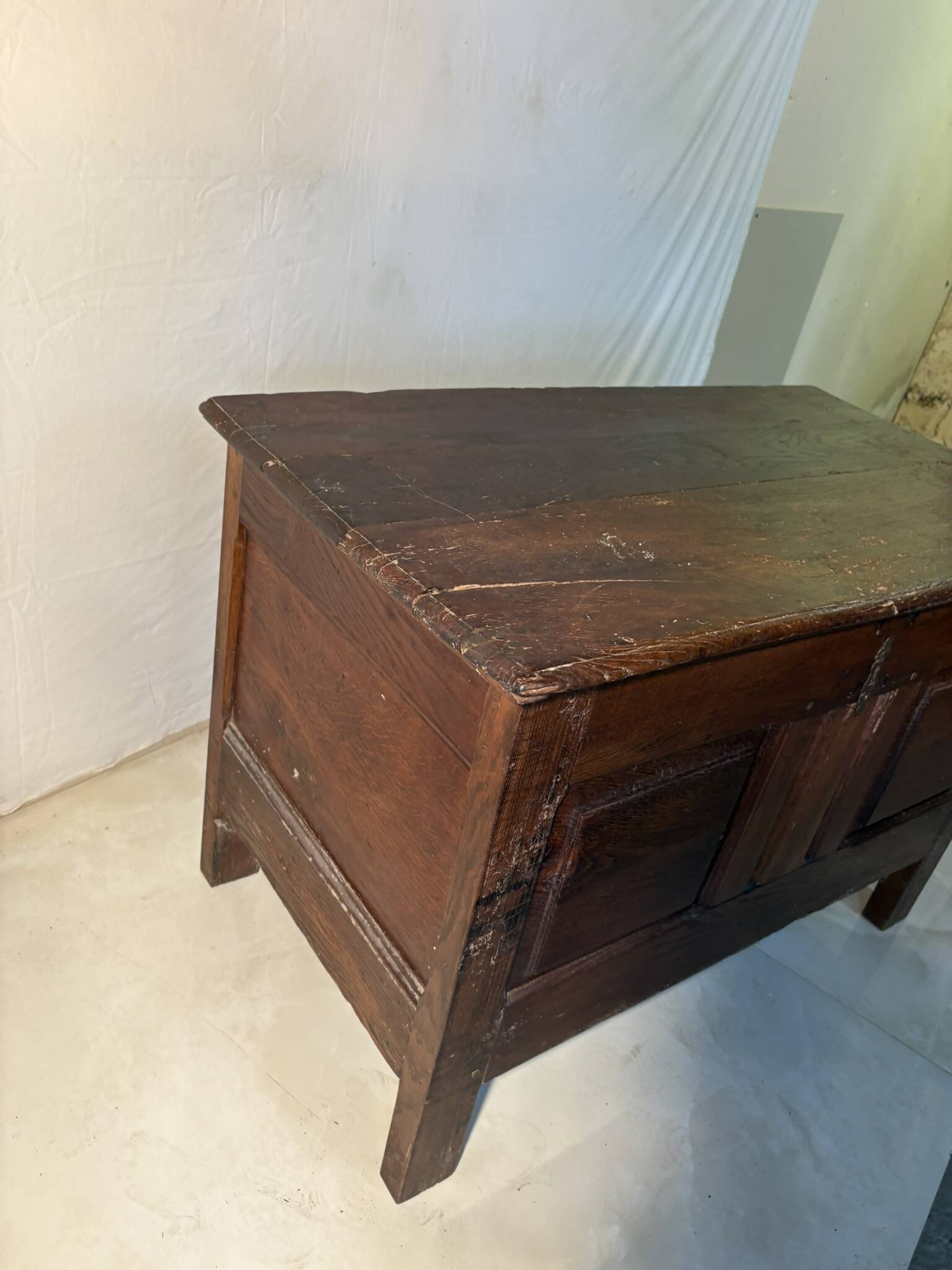 Antique rustic oak chest with original hardware and molded panels