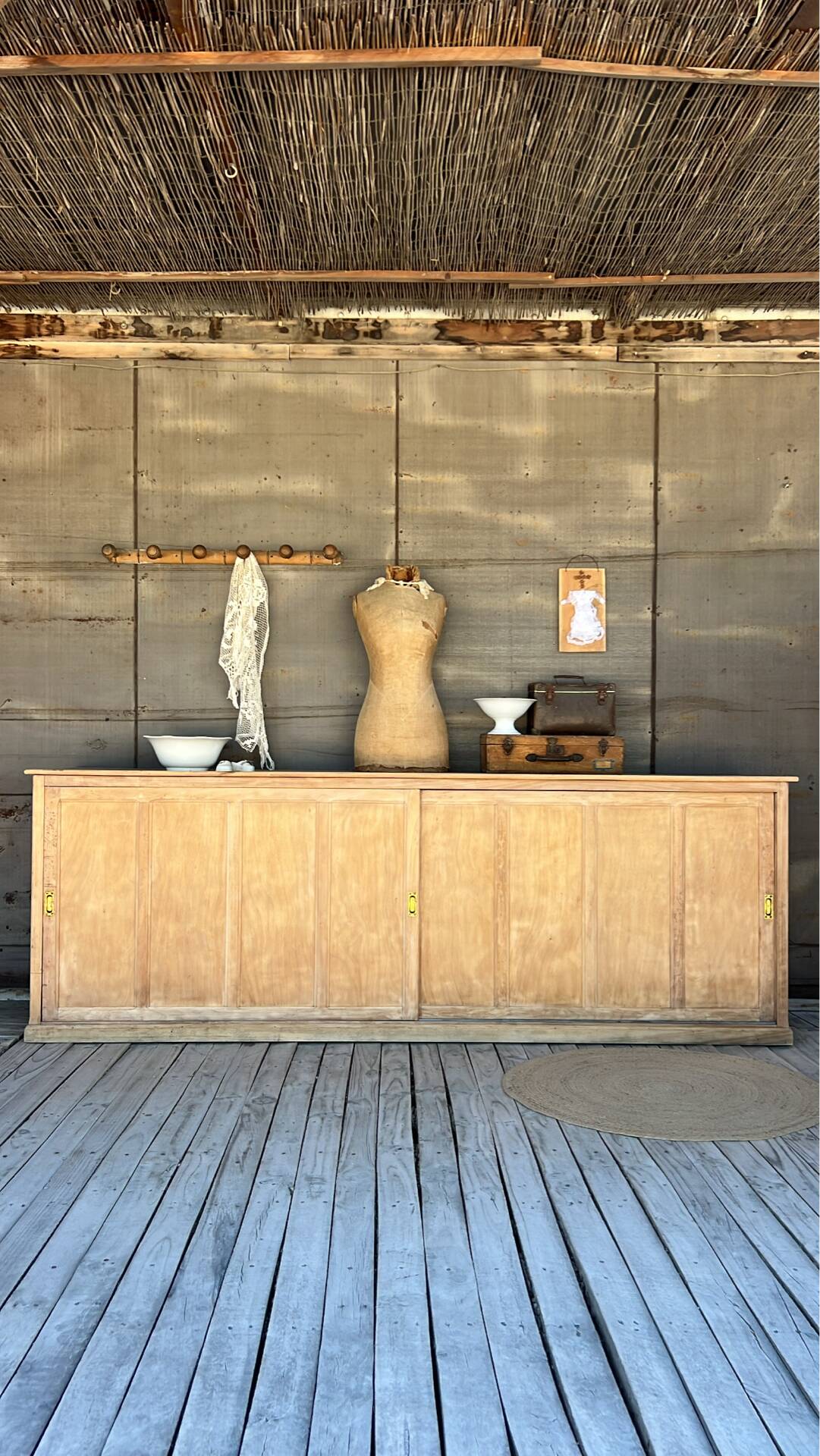 Old counter with sliding doors in raw wood