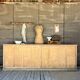 Old counter with sliding doors in raw wood