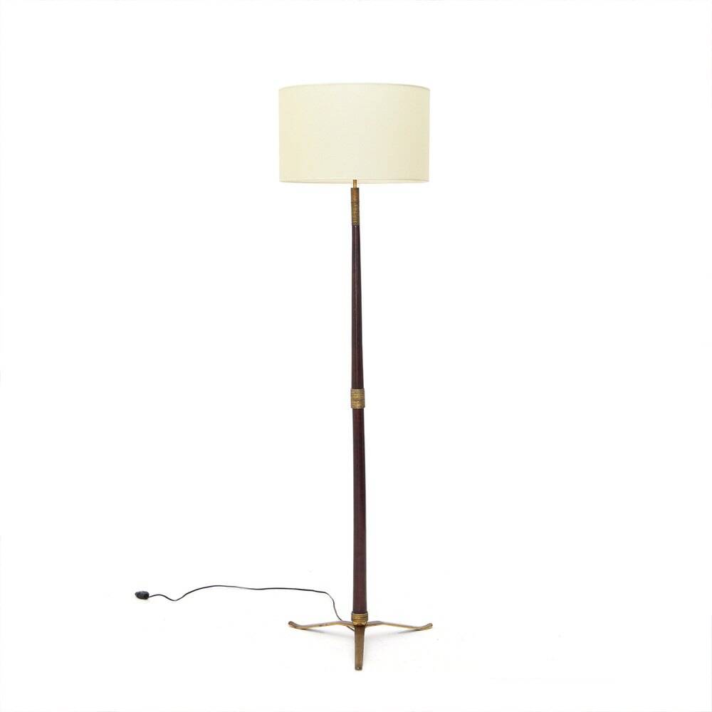 Floor lamp with a brass base and parchment shade, 1940s.