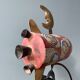 Old painted sheet metal pendulum toy