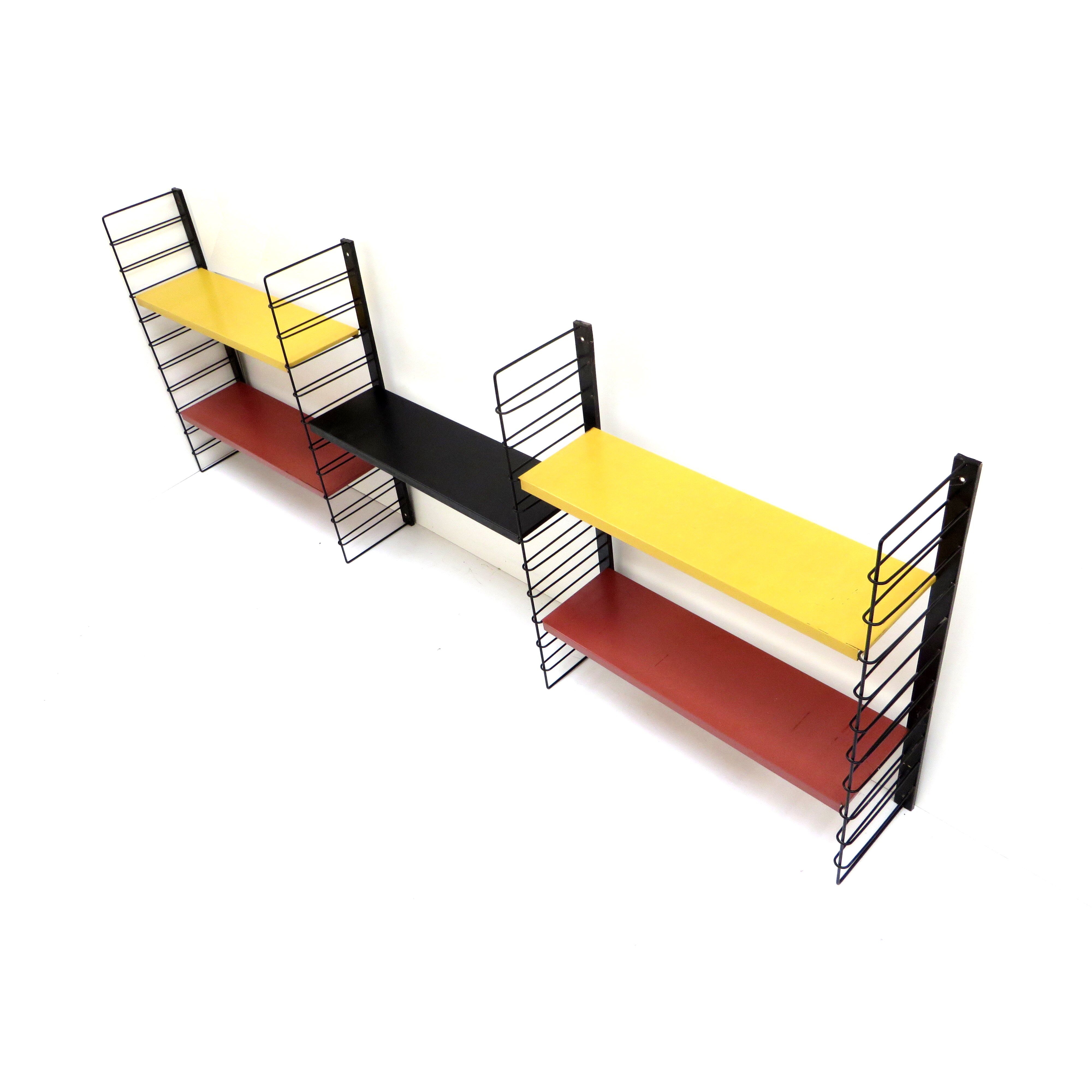 Vintage bookshelf / wall system from Tomado in metal with black frame with 5 shelves