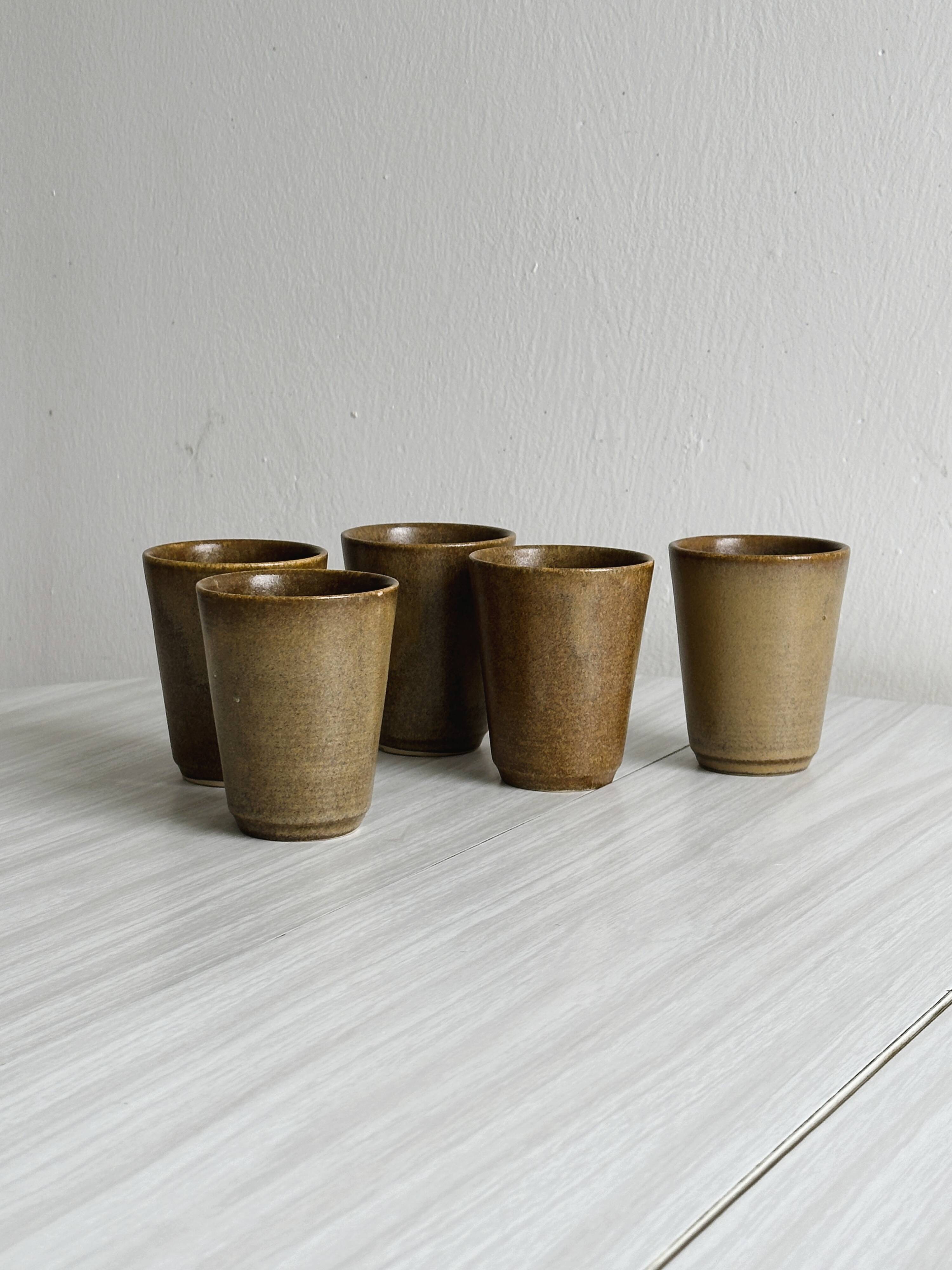 Set of 5 Digoin stoneware mugs