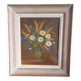 An old painting in oil on canvas depicting a bouquet of flowers.