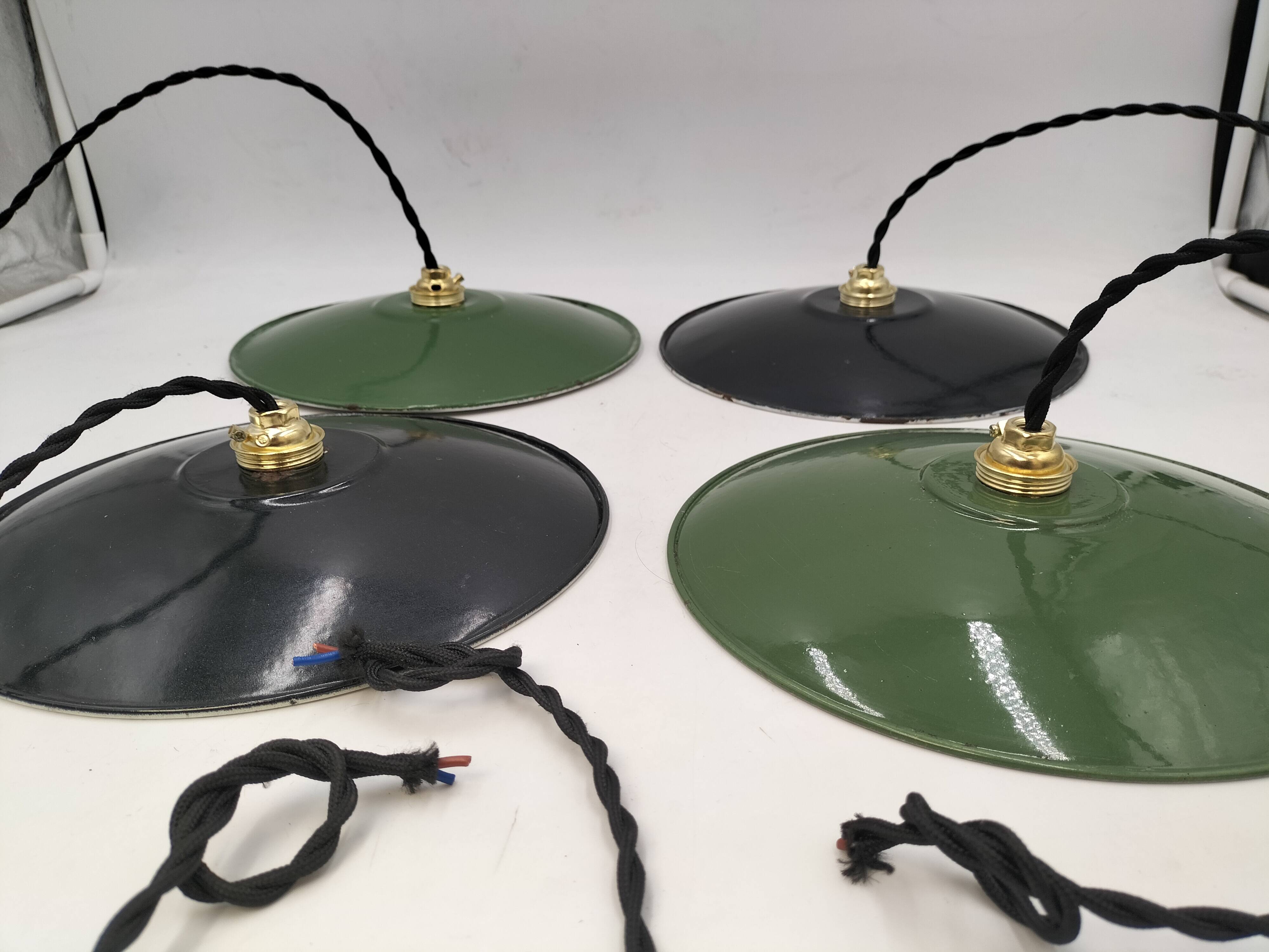 4 enameled sheet metal pendants