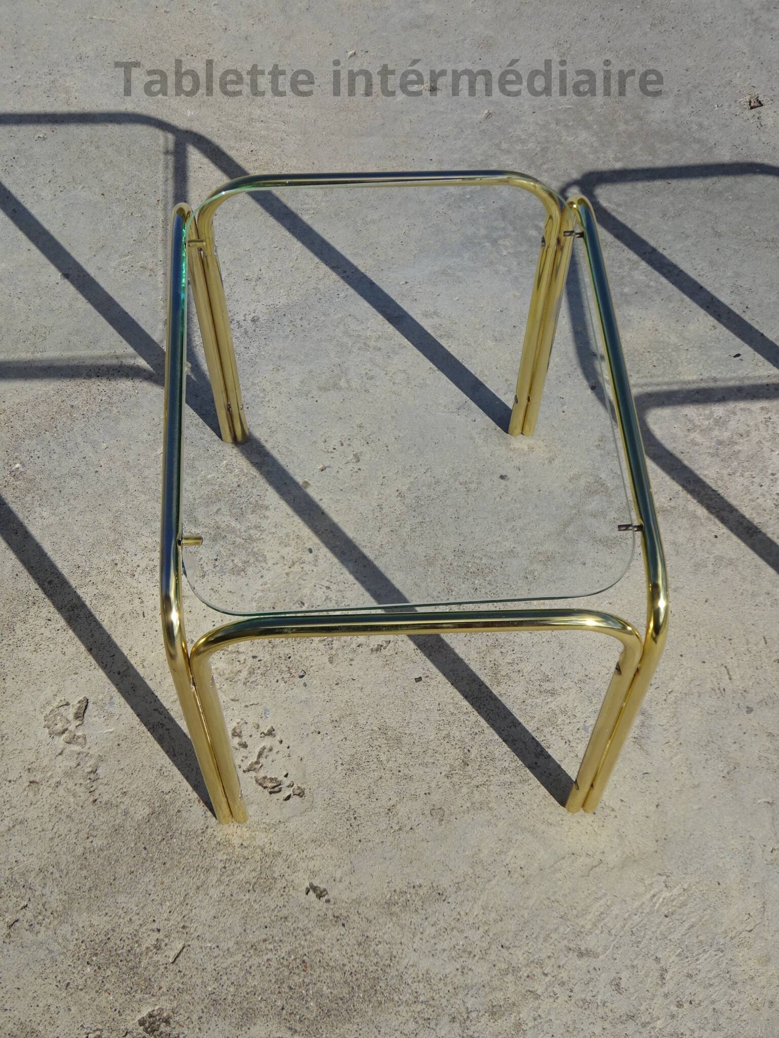 Nesting tables in gold-tone metal and glass