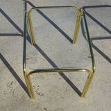 Nesting tables in gold-tone metal and glass