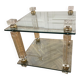 Glass side table with gold decorations.