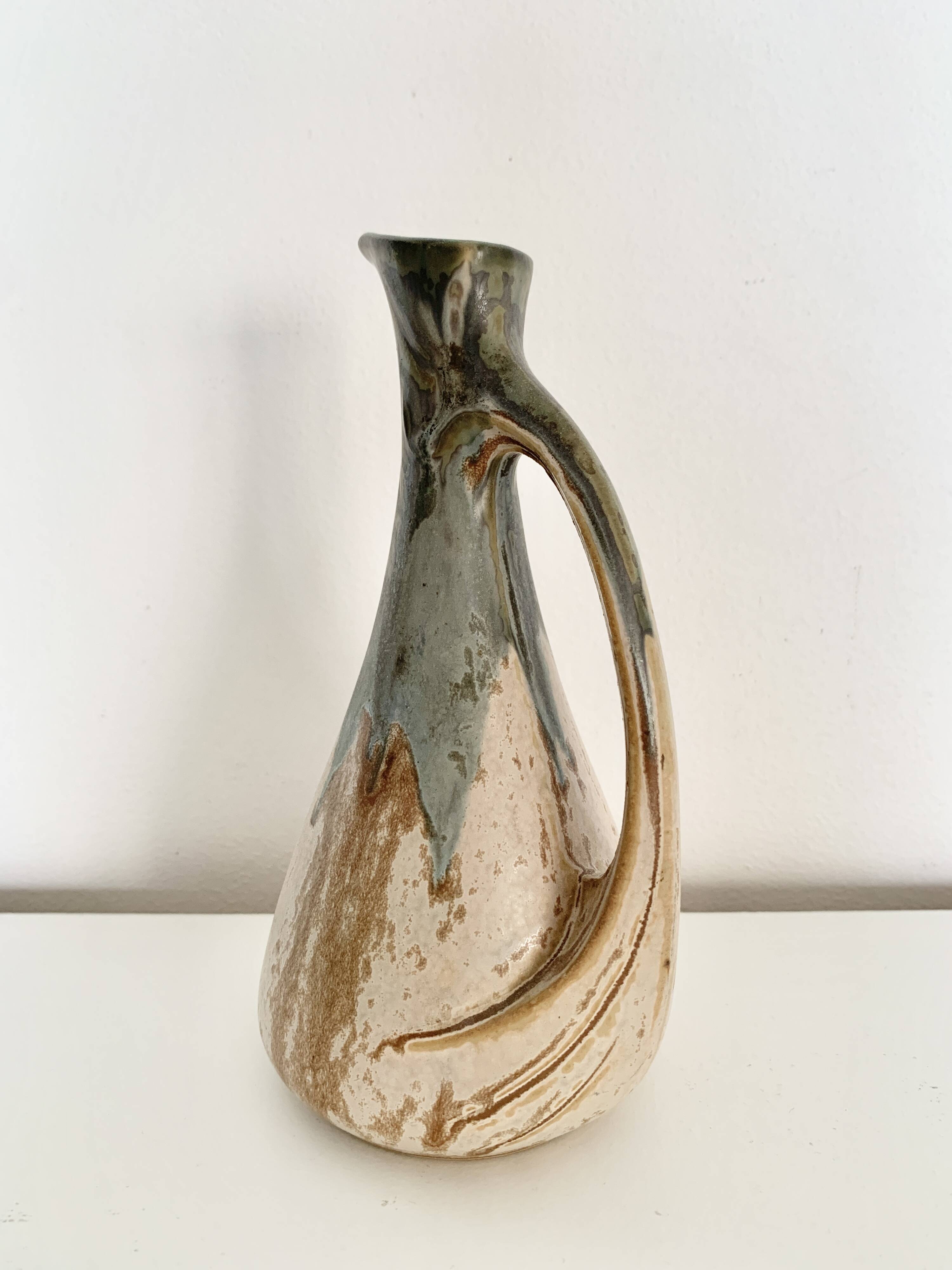 Stoneware jug signed Denbac