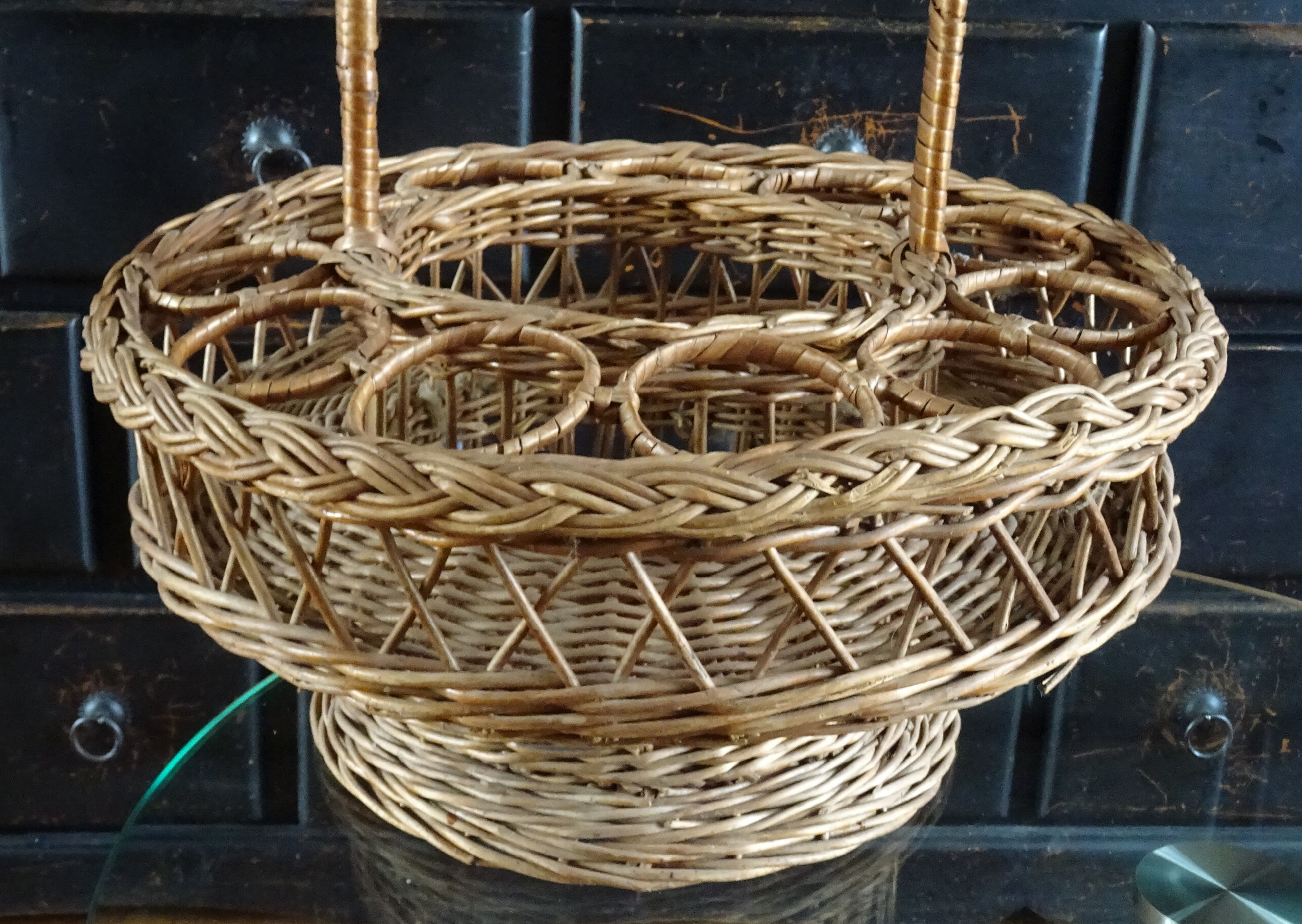 Vintage wicker bottle and glass holder