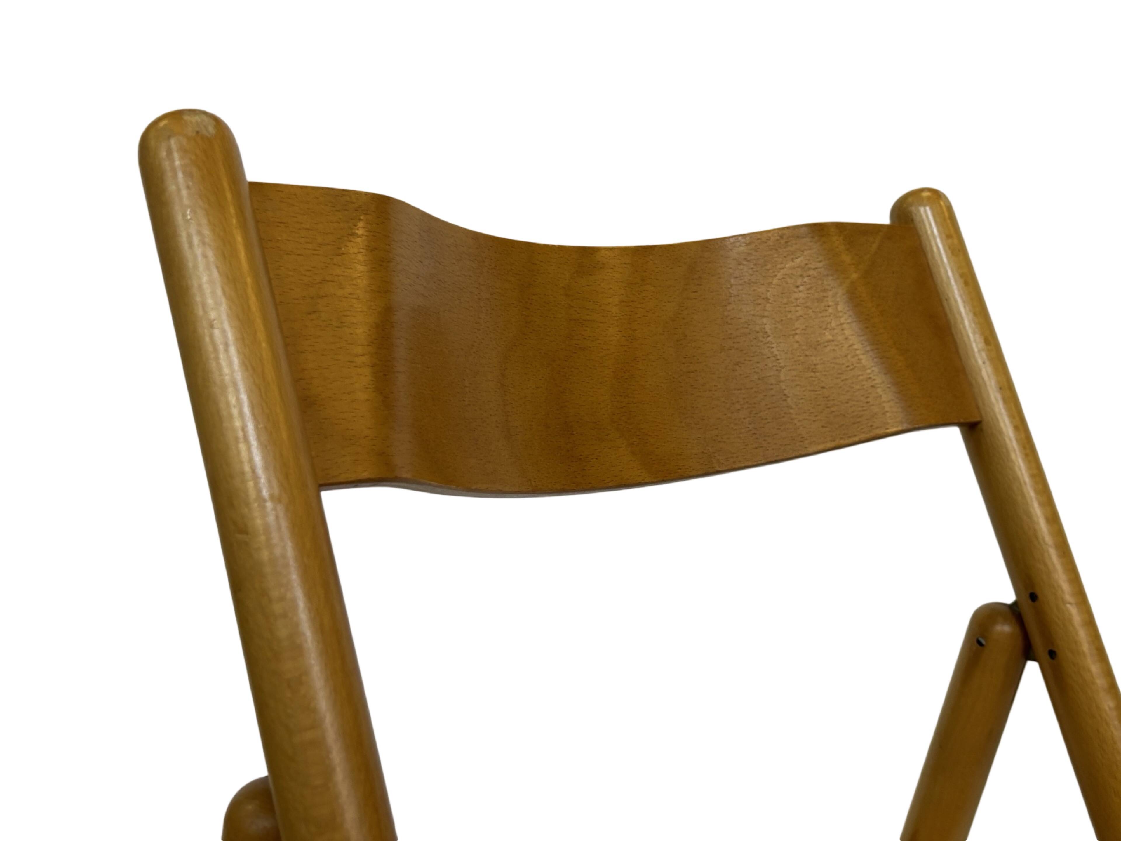 Vintage wooden folding chair with rattan seat 80s minimalist design